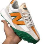 New Balance Tricolore : Sneakers élégantes et confortables, alliant style audacieux et performance pour un look décontracté et sportif au quotidien
