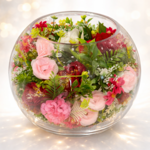 Vase boule en verre avec composition florale artificielle